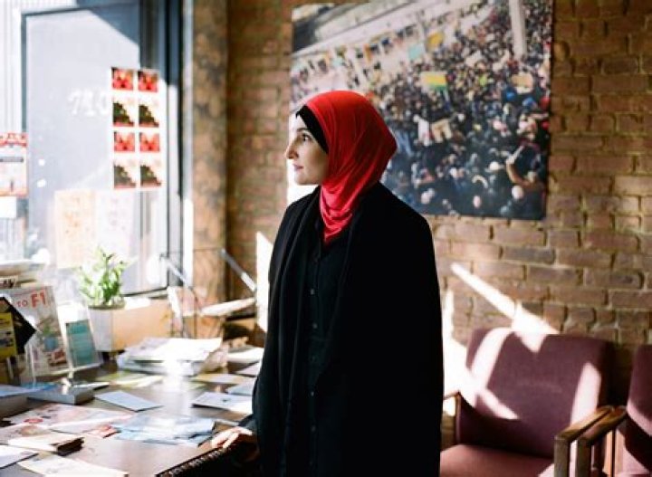 Who is Linda Sarsour, the husband and what does she think of Sharia?